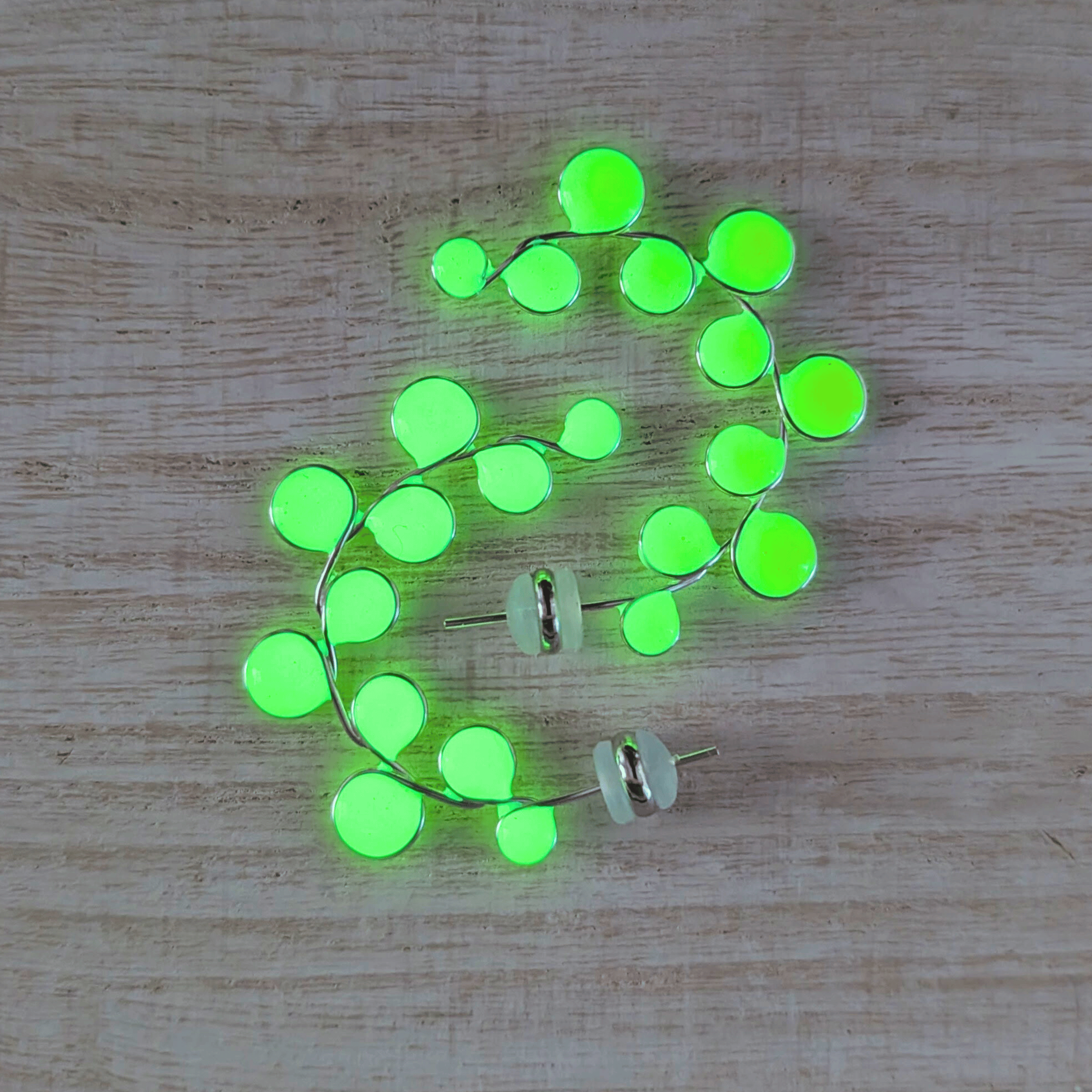Neon yellow glow in the dark hoop earrings