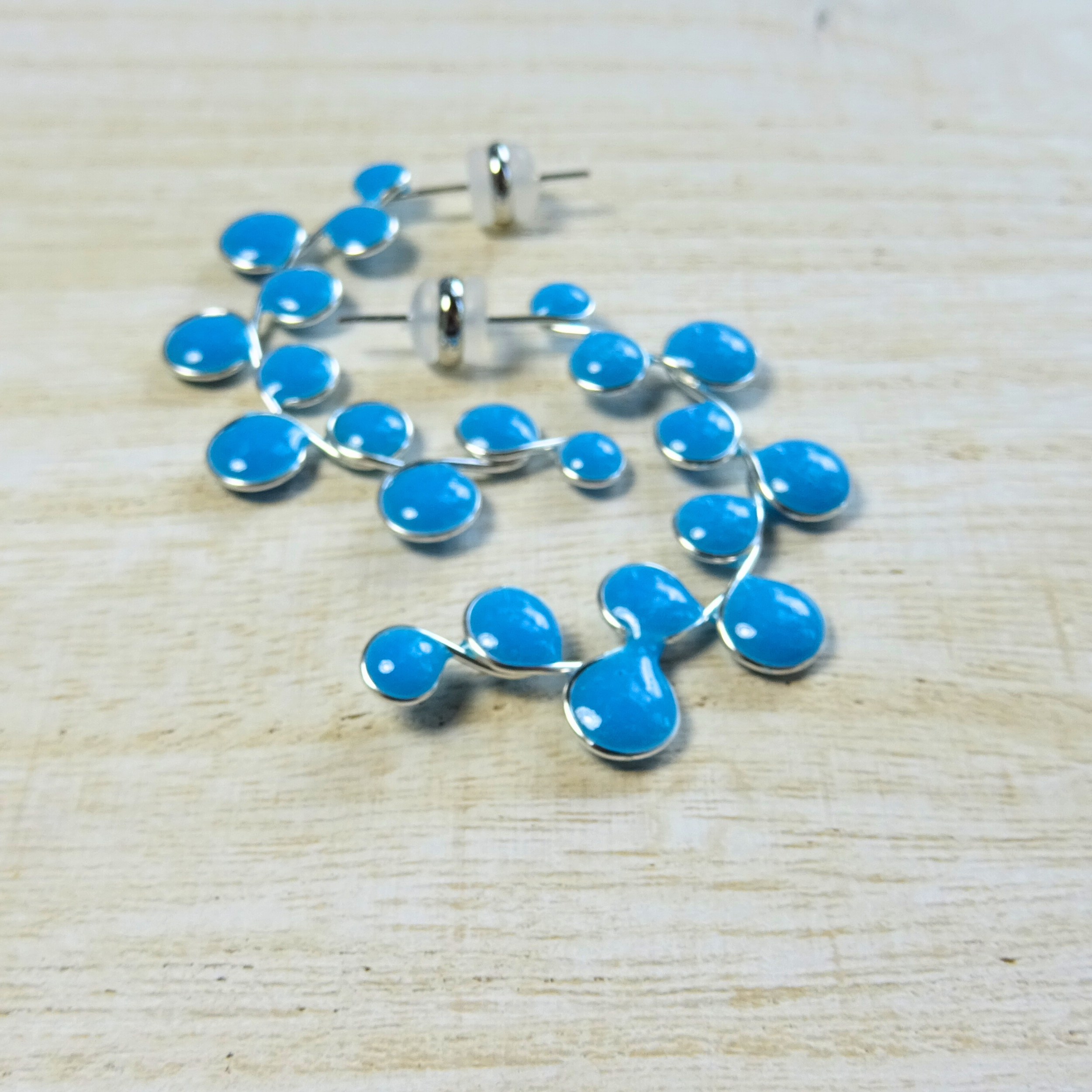 Blue glow in the dark hoop earrings