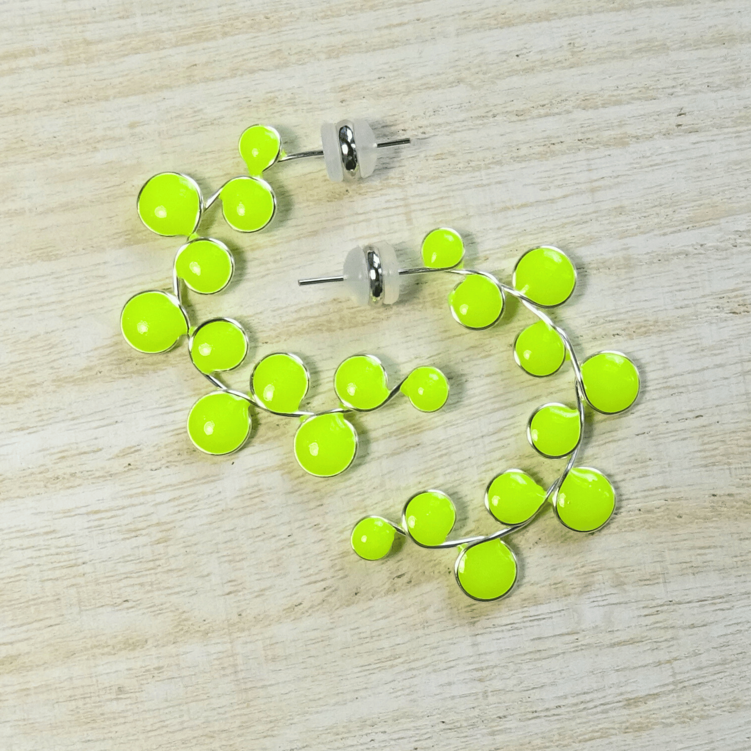 Neon yellow glow in the dark hoop earrings