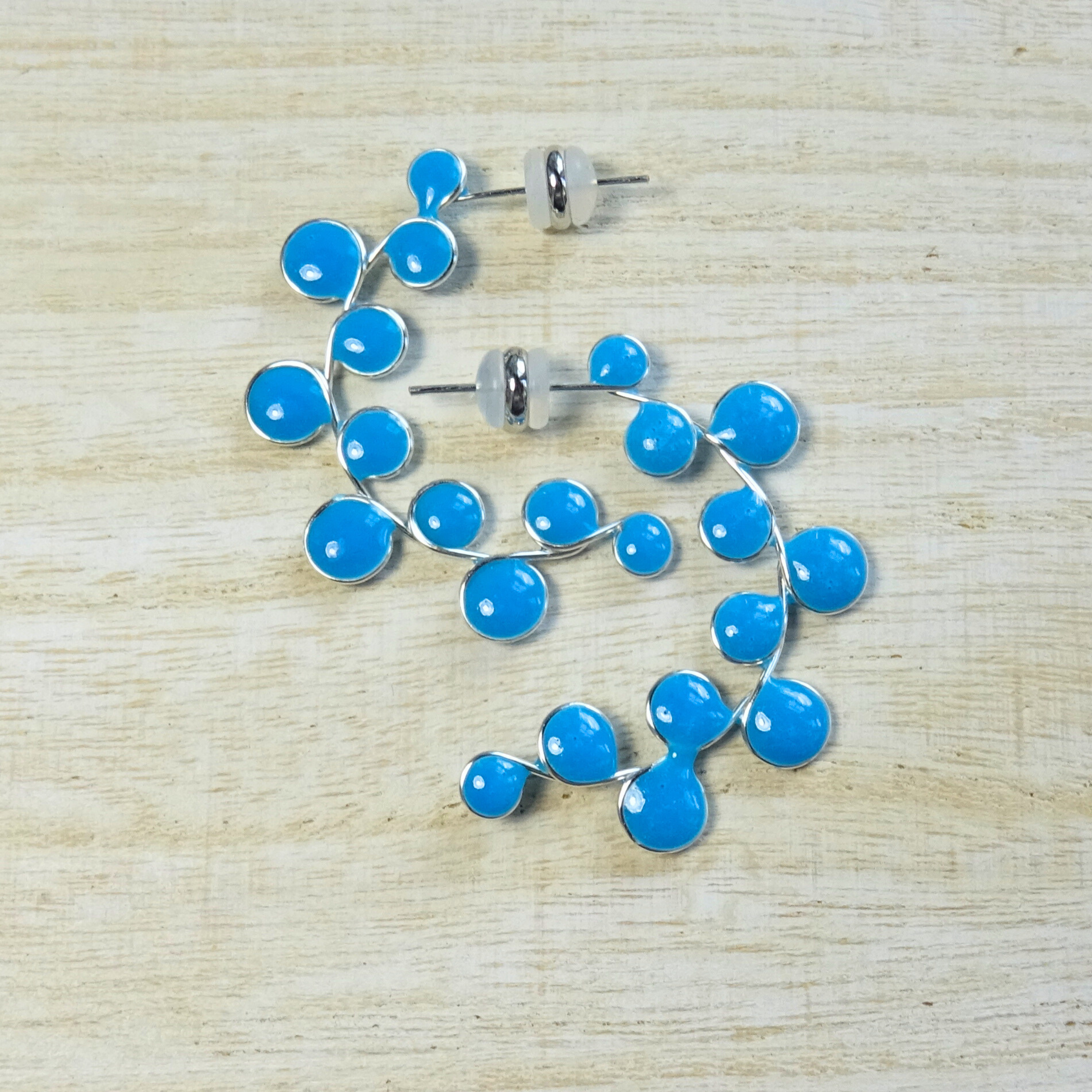 Blue glow in the dark hoop earrings