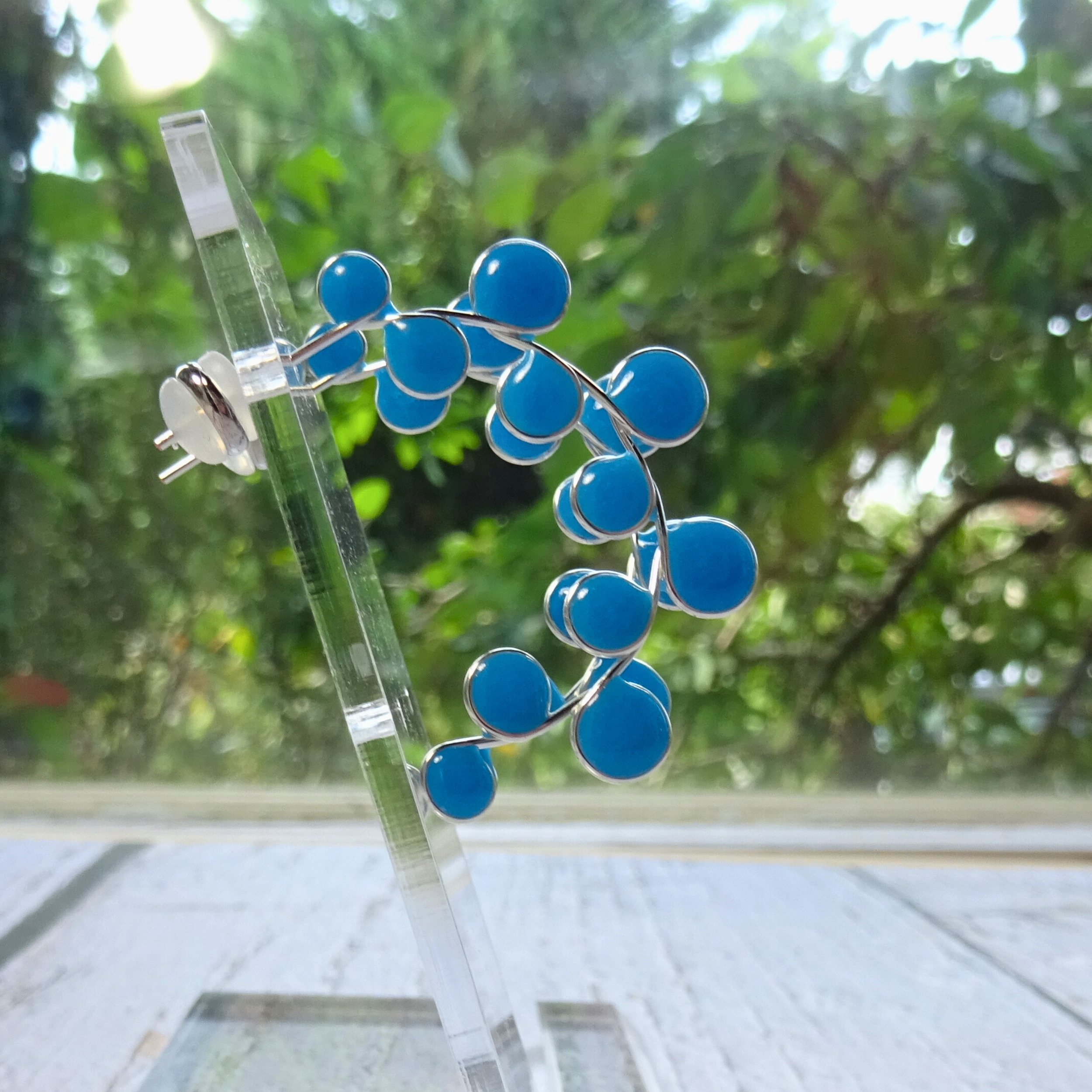 Blue glow in the dark hoop earrings