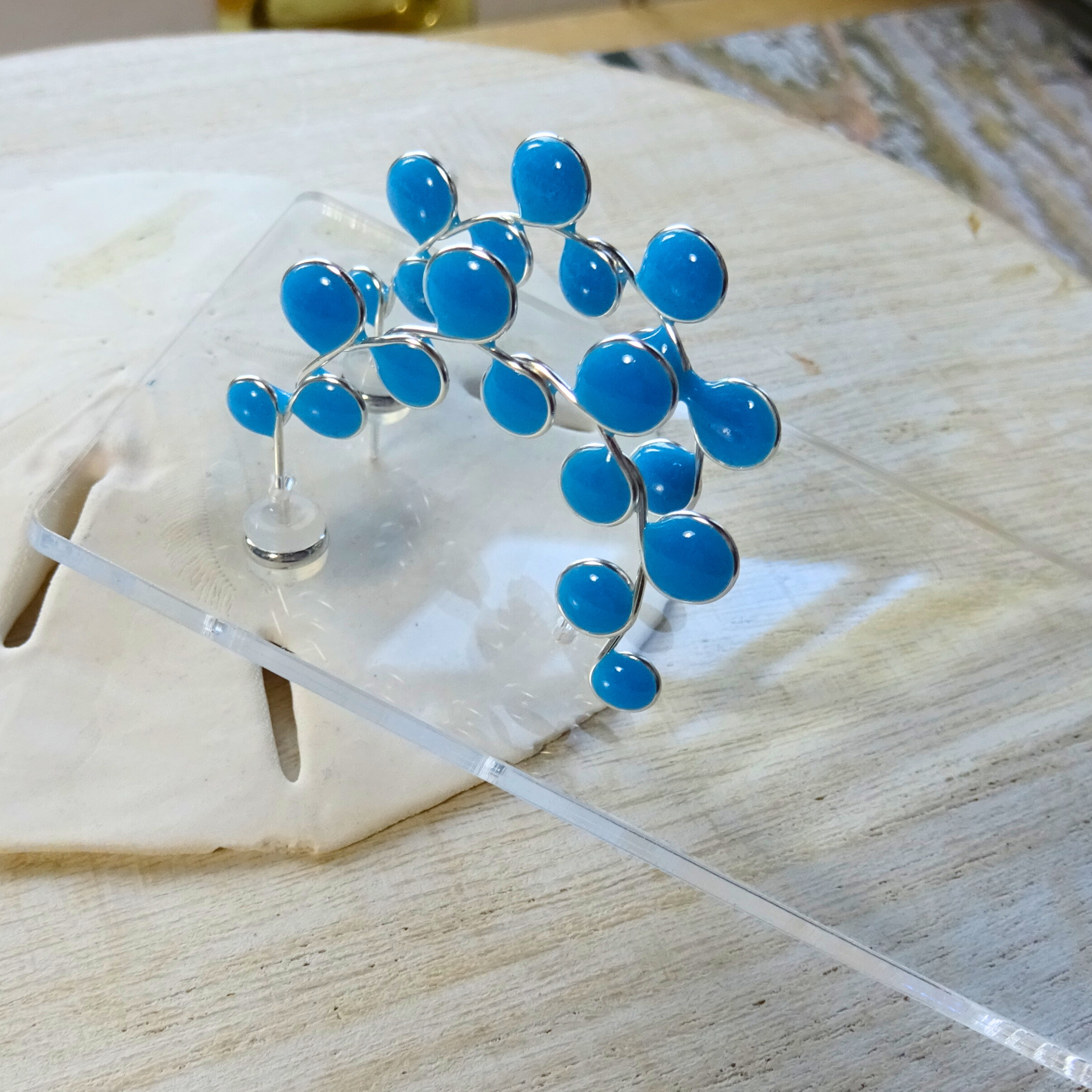 Blue glow in the dark hoop earrings