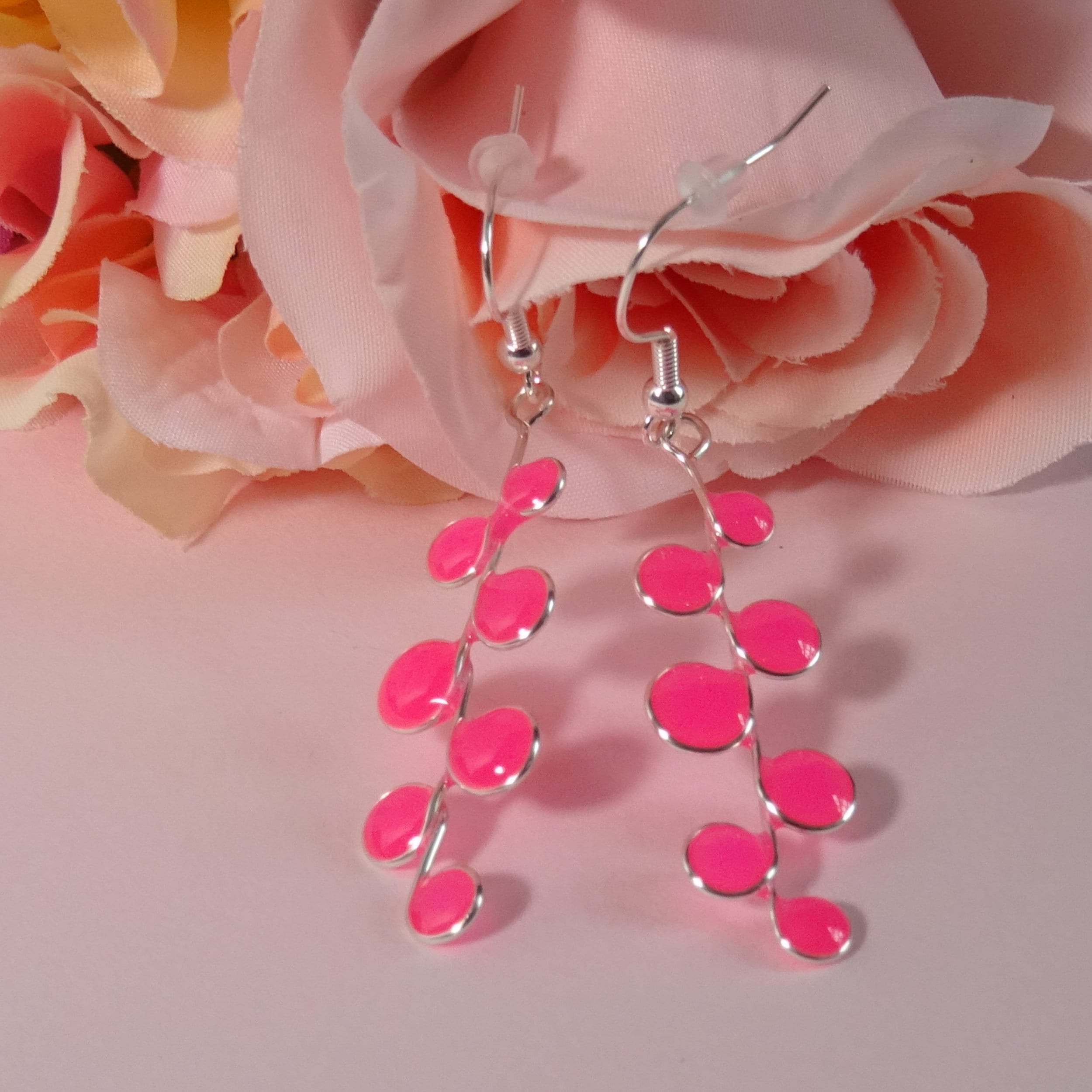 Neon pink glow in the dark earrings