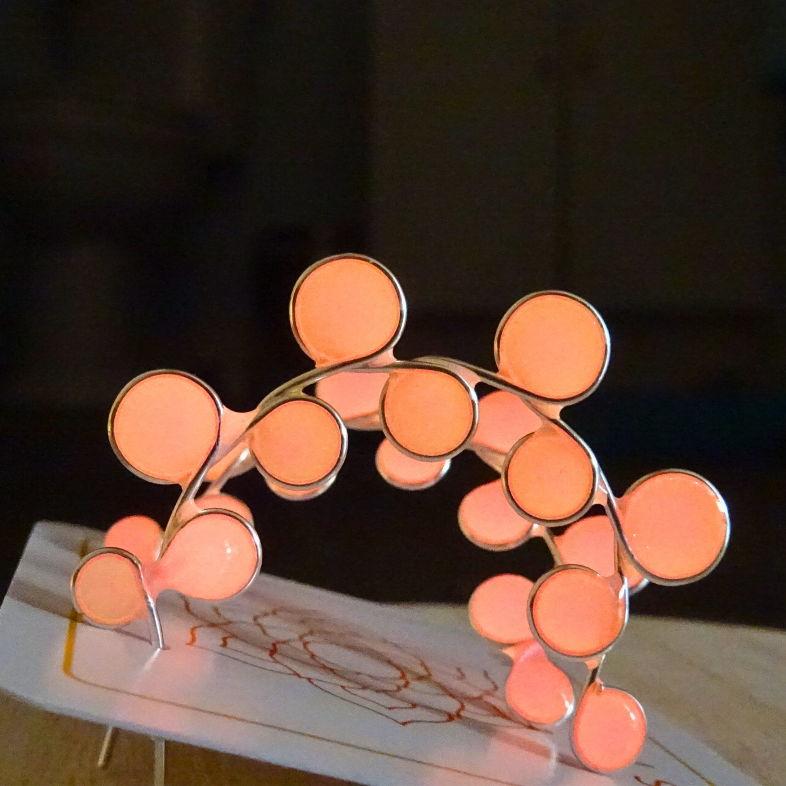 Neon pink glow in the dark hoop earrings