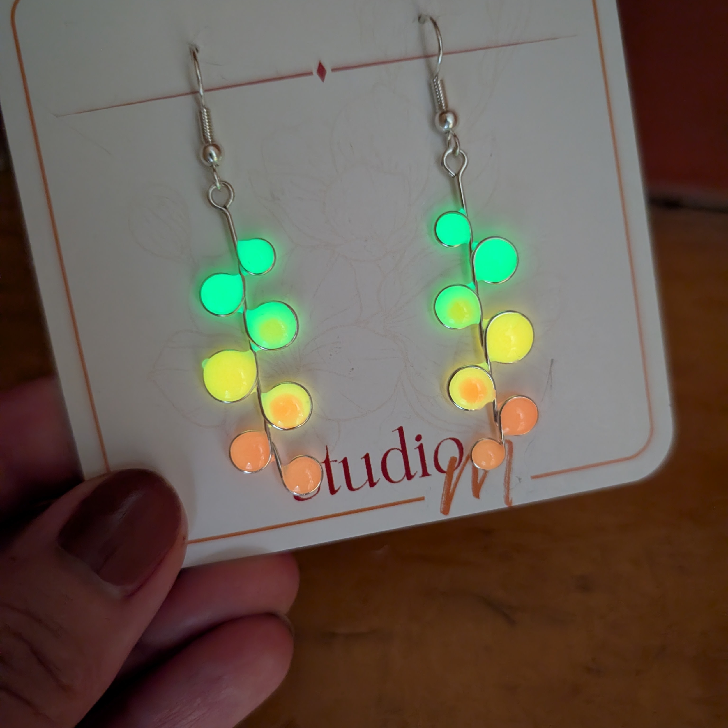 Peachy neon glow in the dark earrings