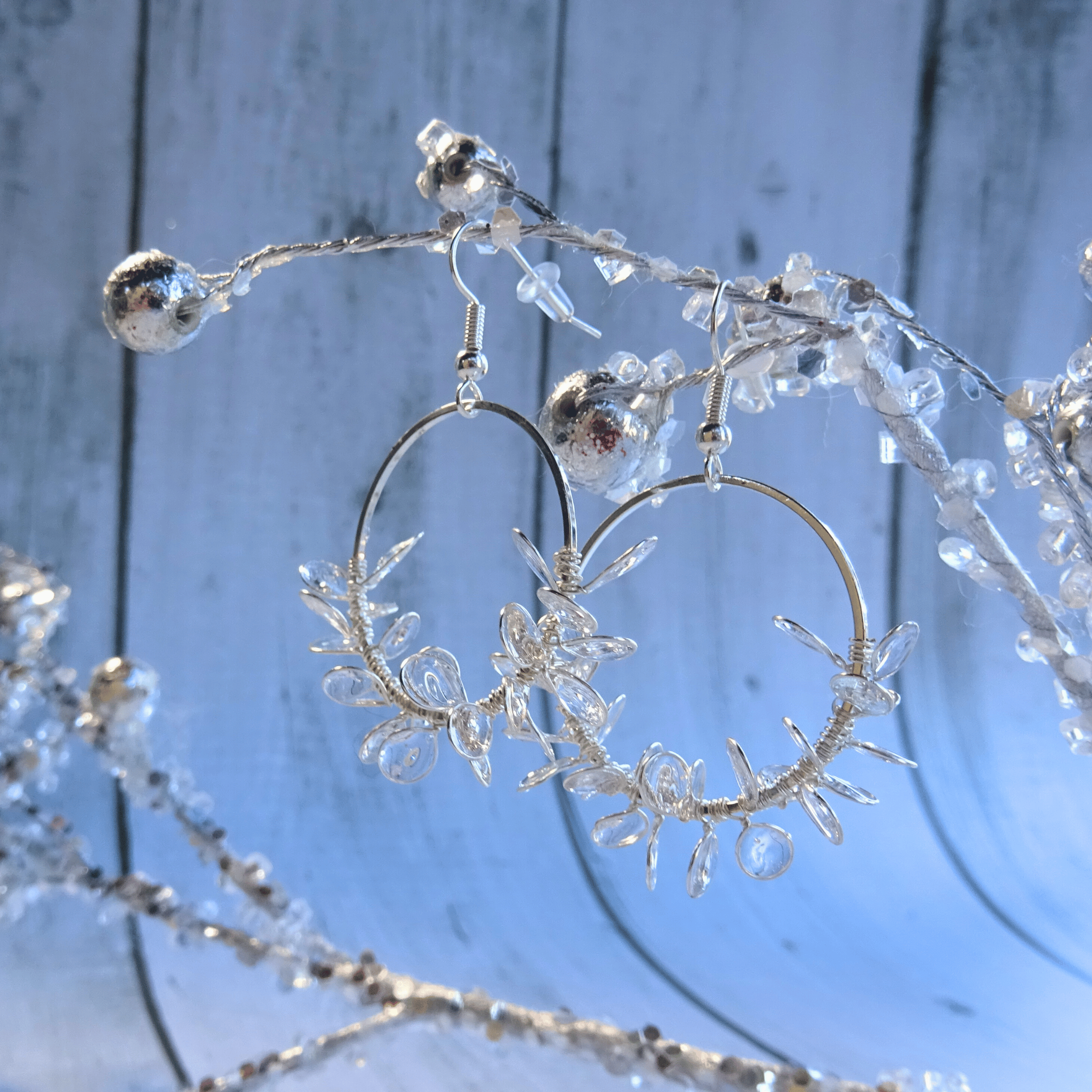 Clear ice flower hoop earrings