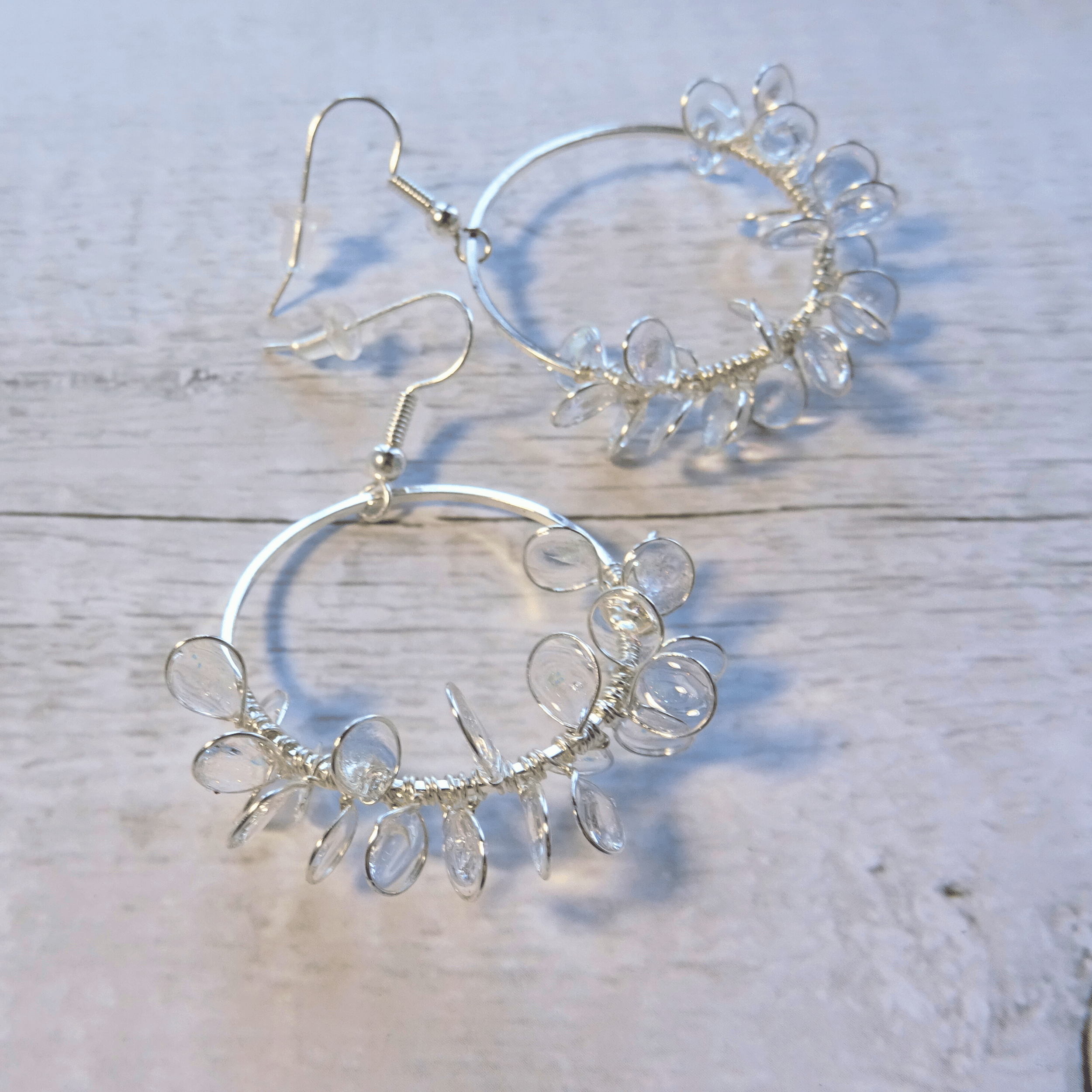 Clear ice flower hoop earrings