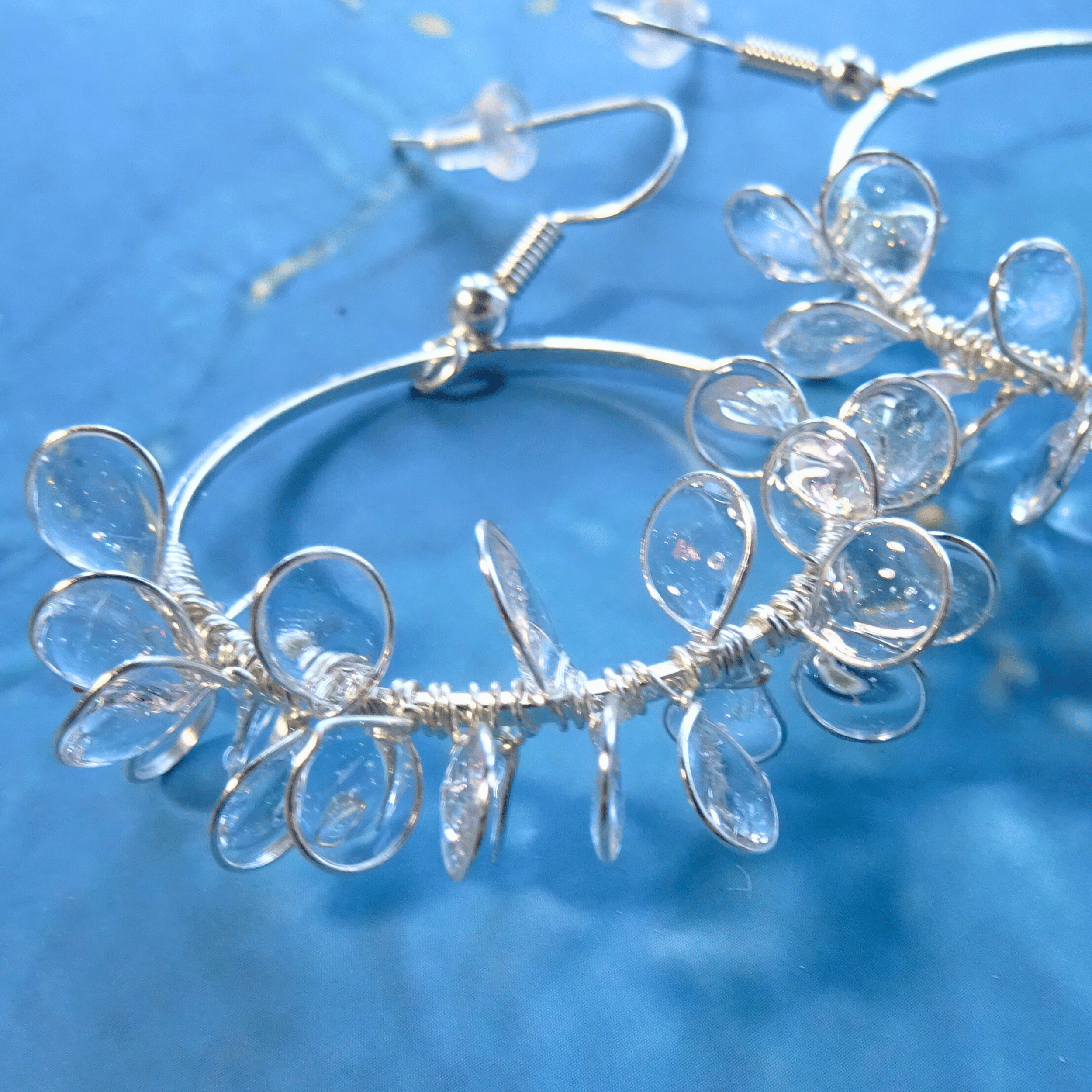 Clear ice flower hoop earrings