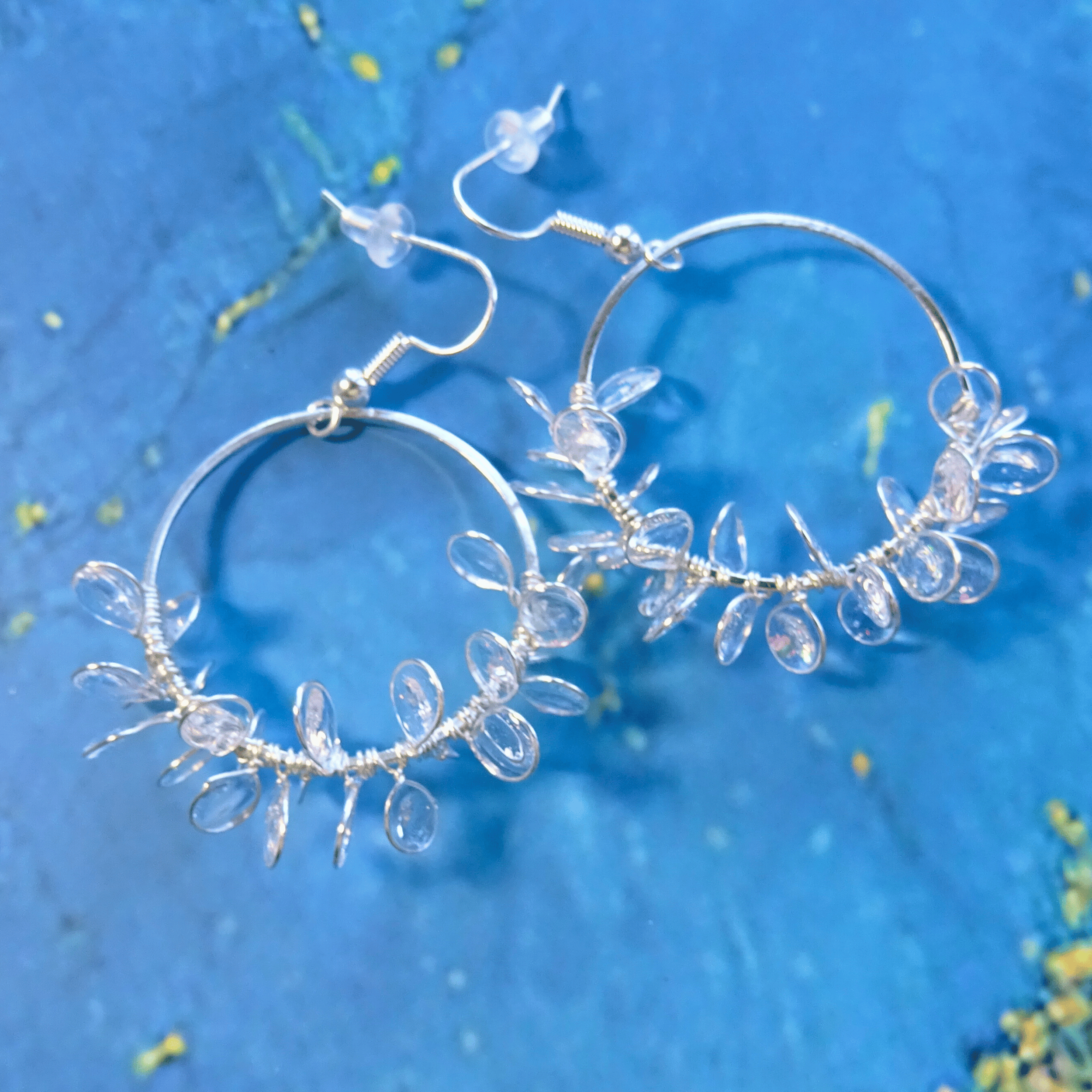 Clear ice flower hoop earrings