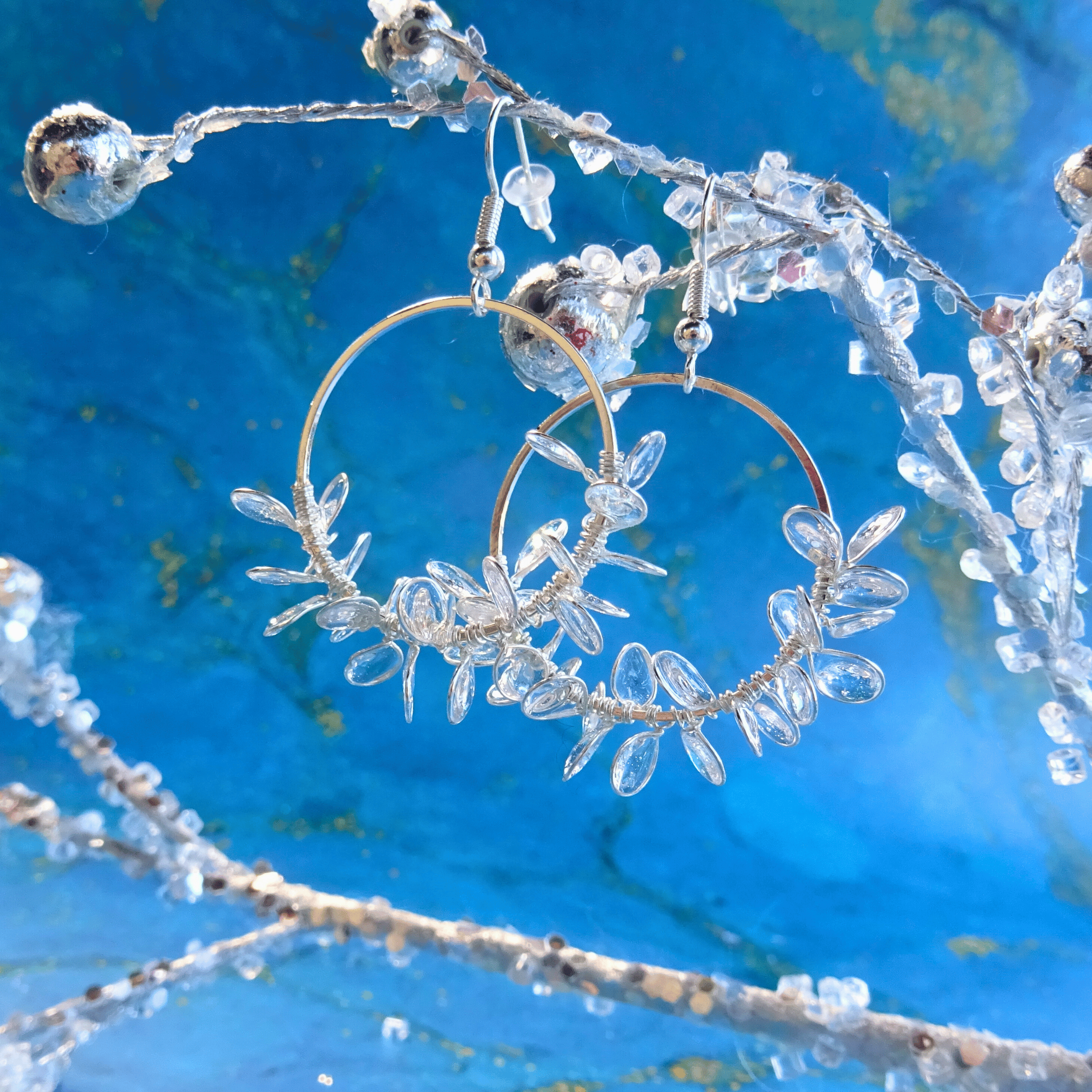 Clear ice flower hoop earrings