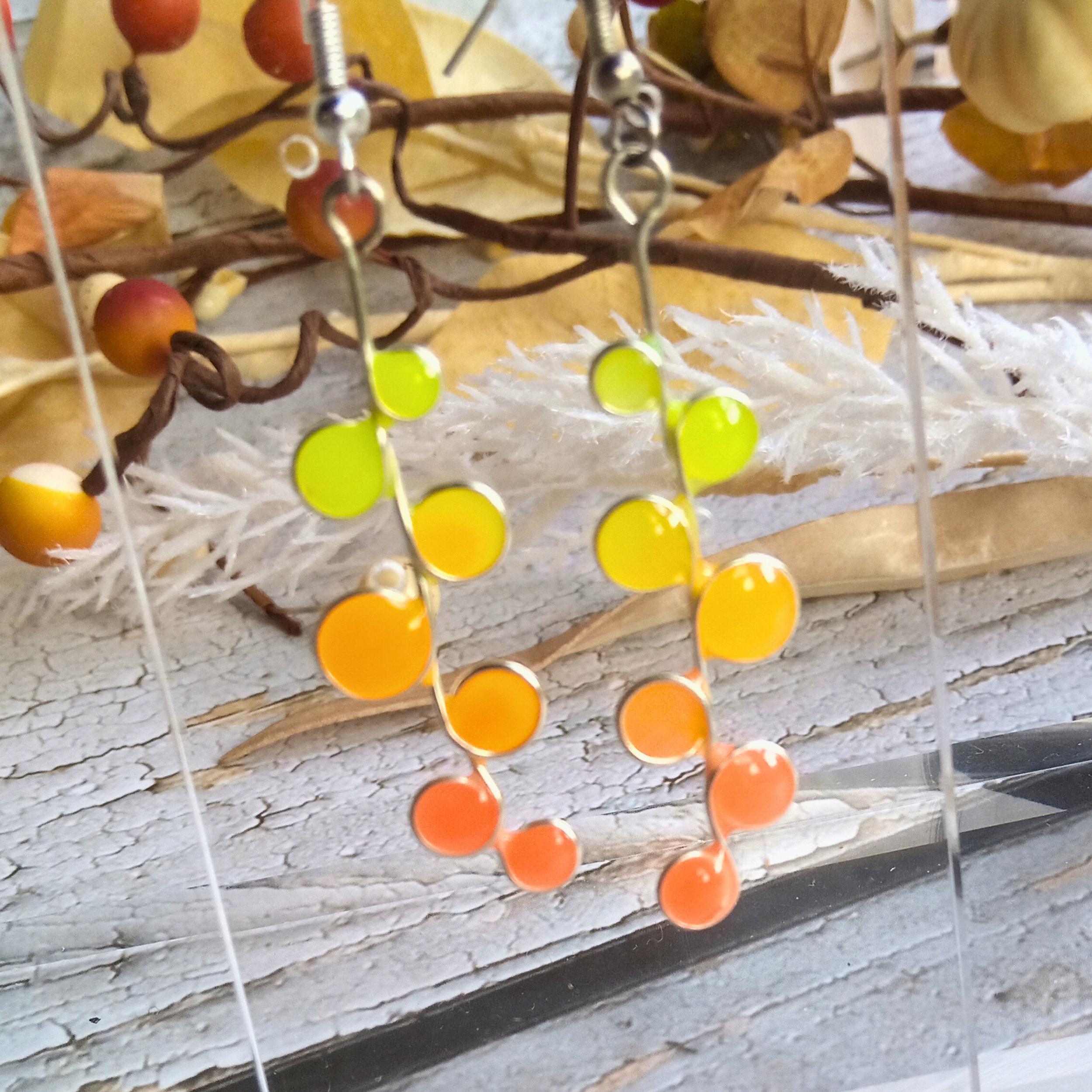 orange dot glow earrings