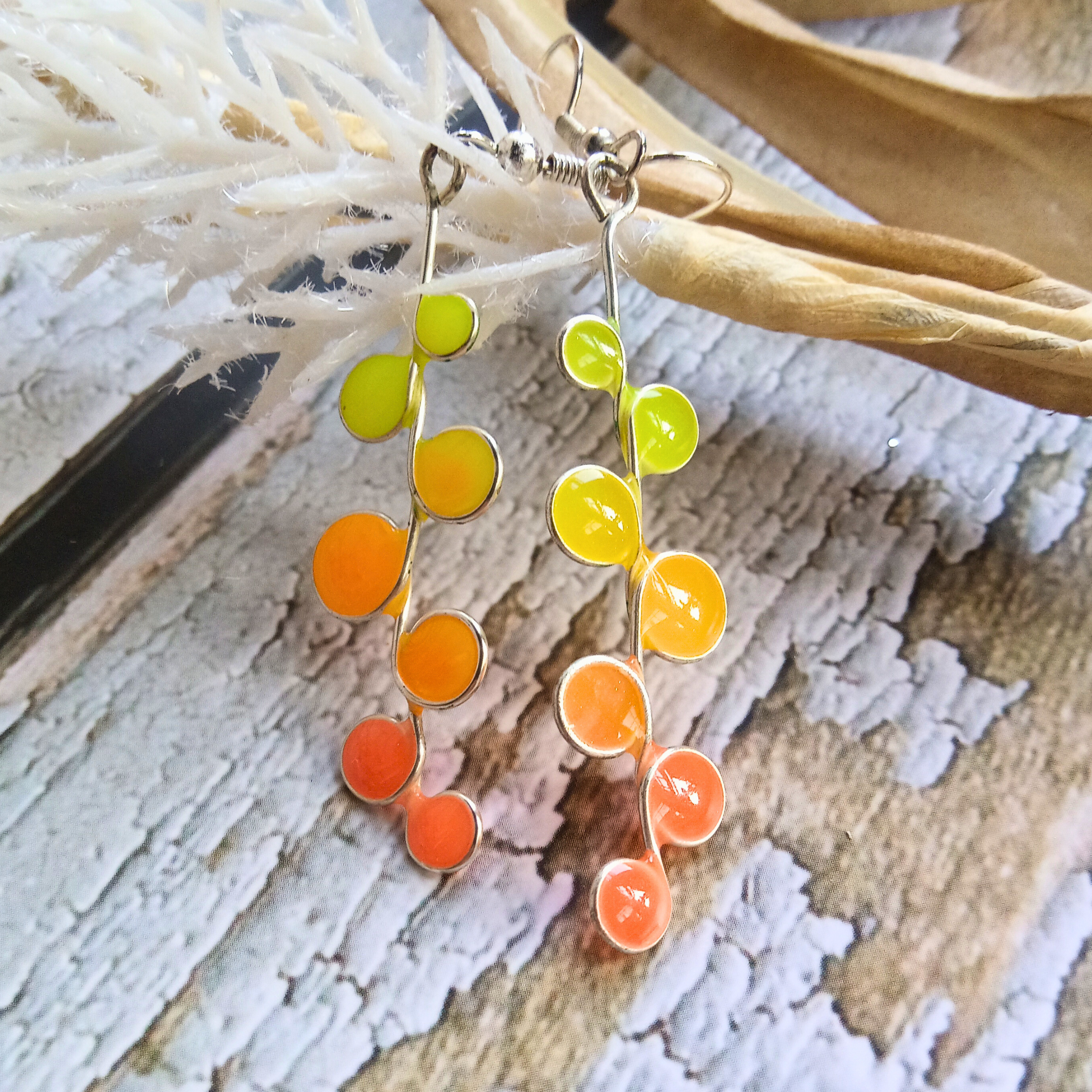 Peachy neon glow in the dark earrings