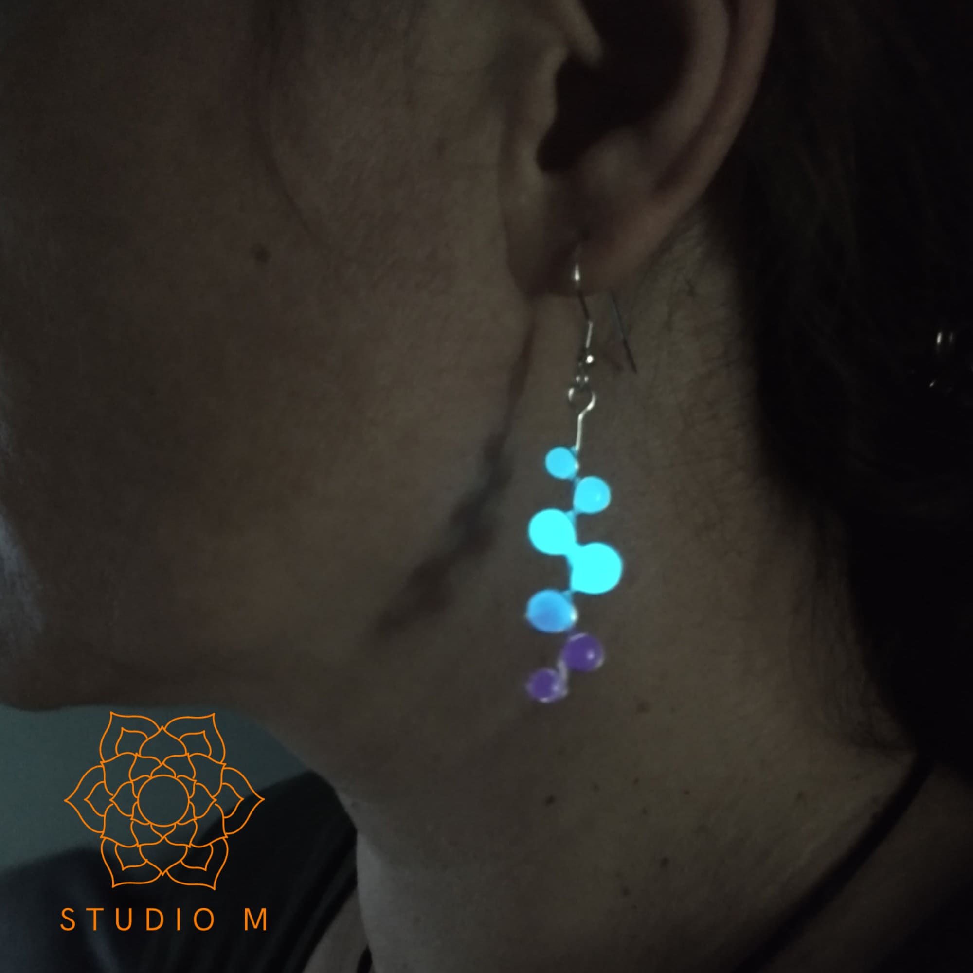 Green, blue, and purple Glow in the Dark Earrings