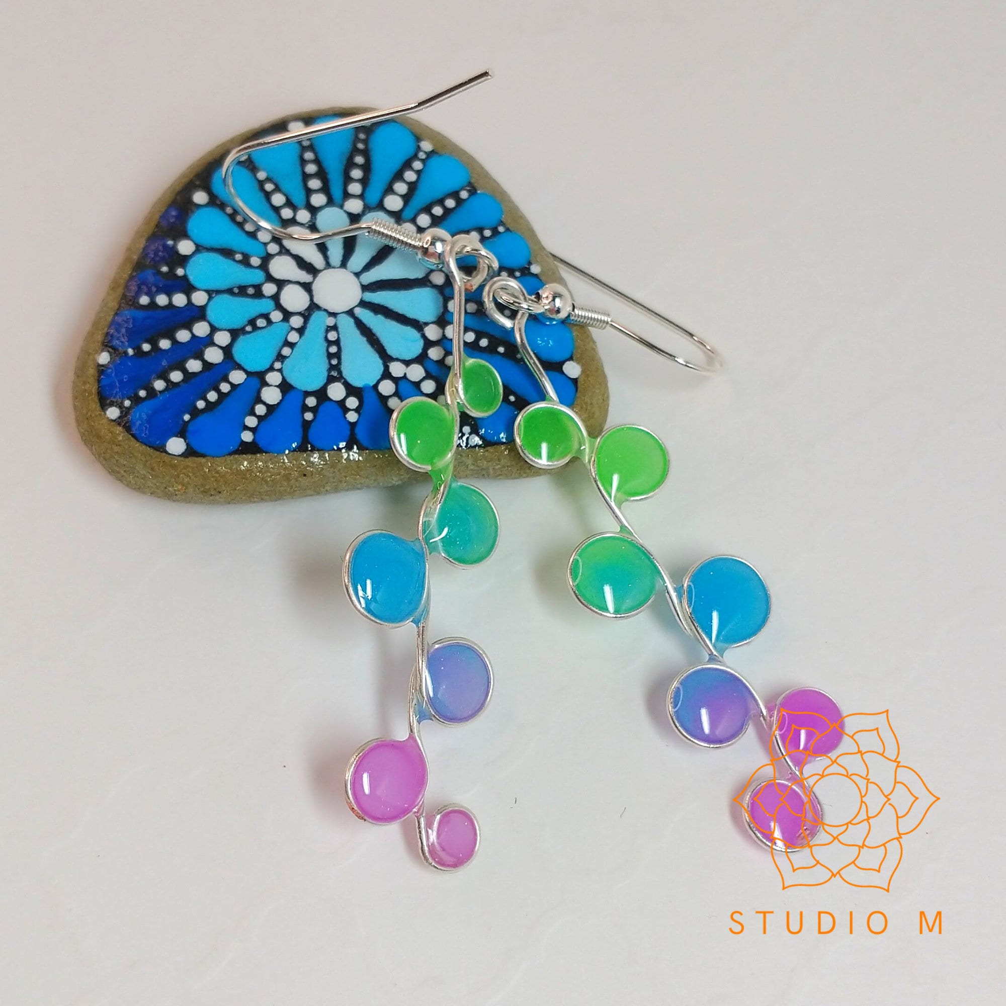 Green, blue, and purple Glow in the Dark Earrings