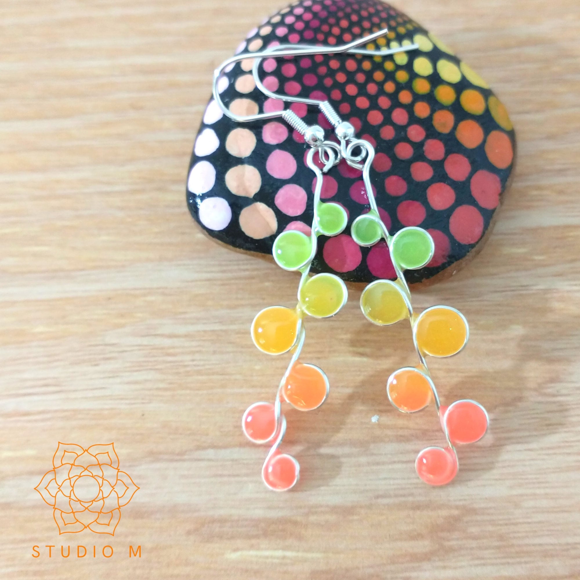 Peachy neon glow in the dark earrings