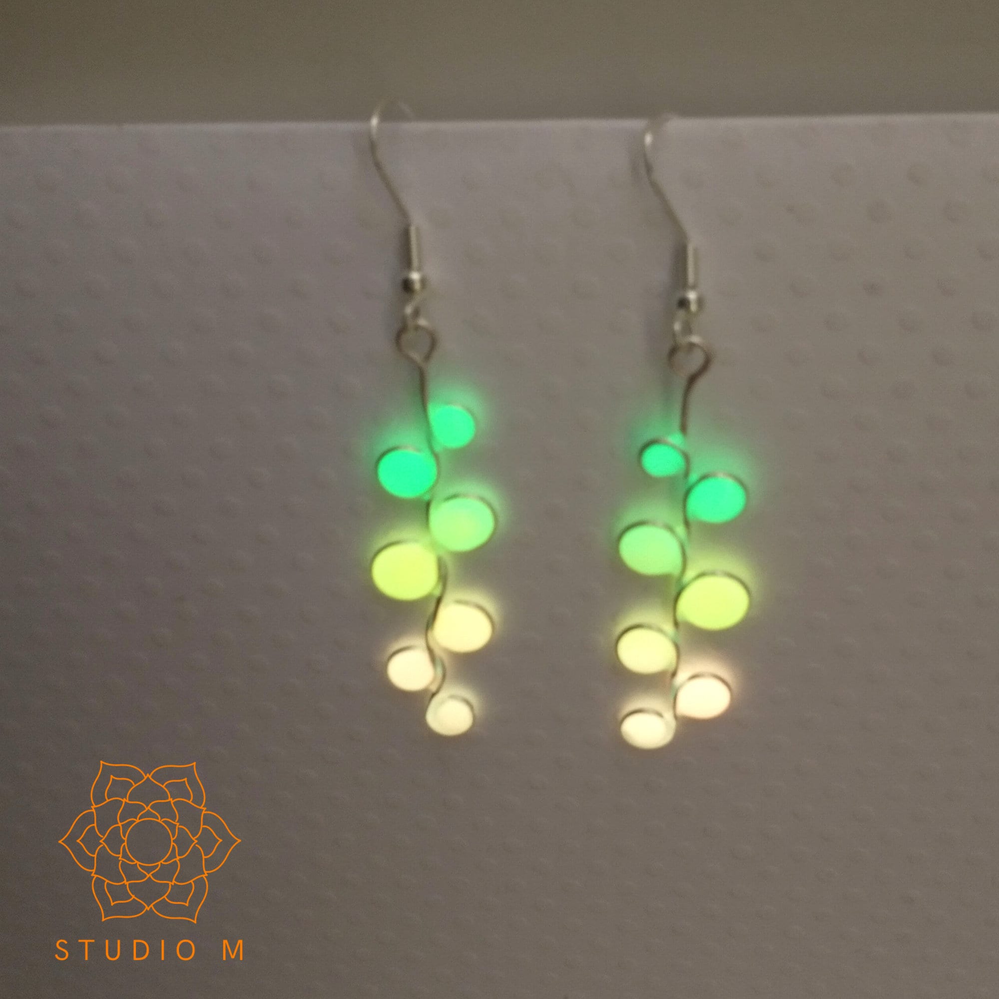 Peachy neon glow in the dark earrings