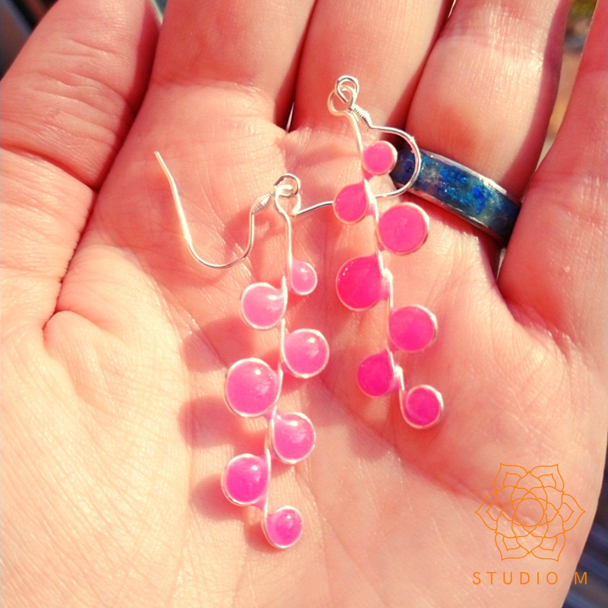 Neon pink glow in the dark earrings