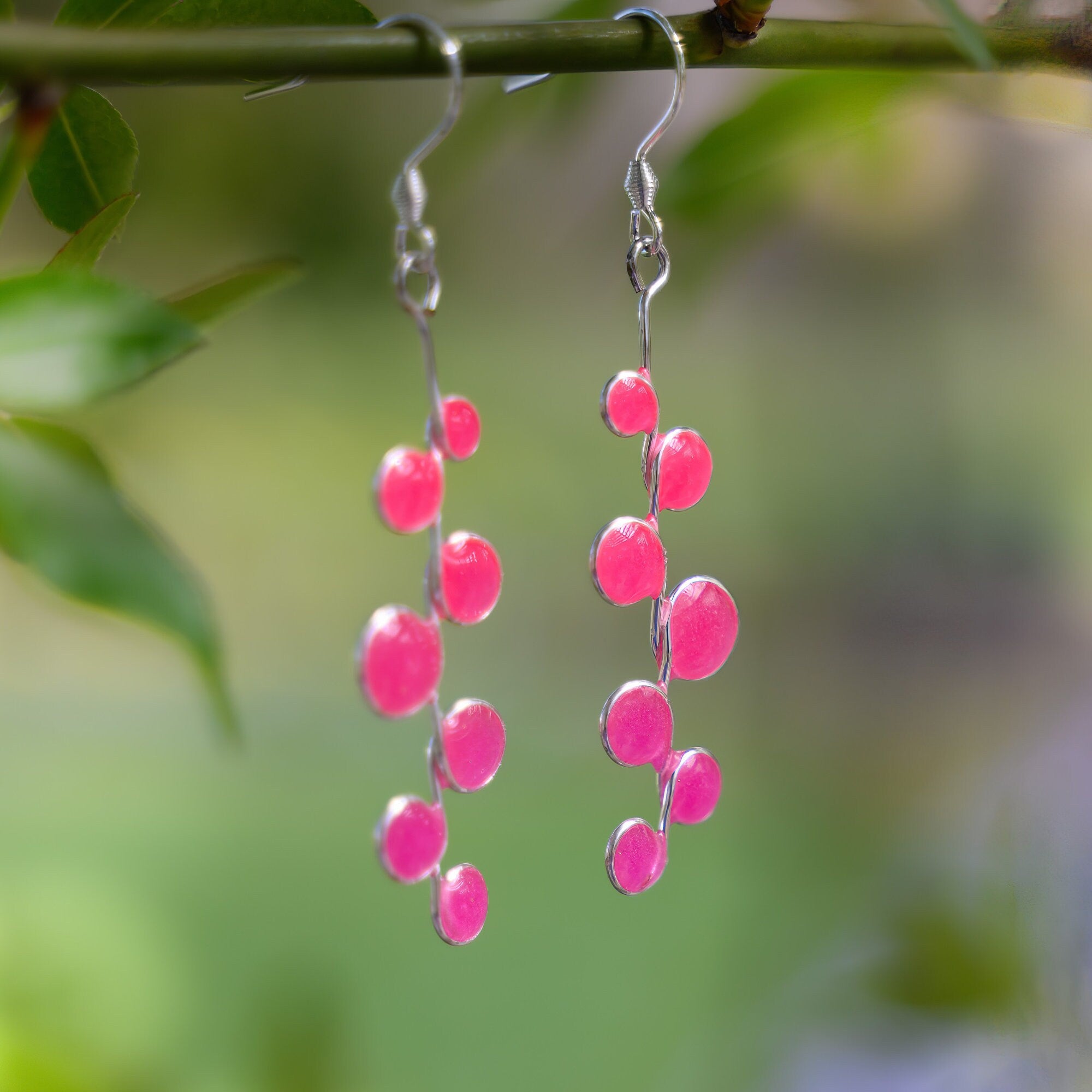 Neon pink glow in the dark earrings