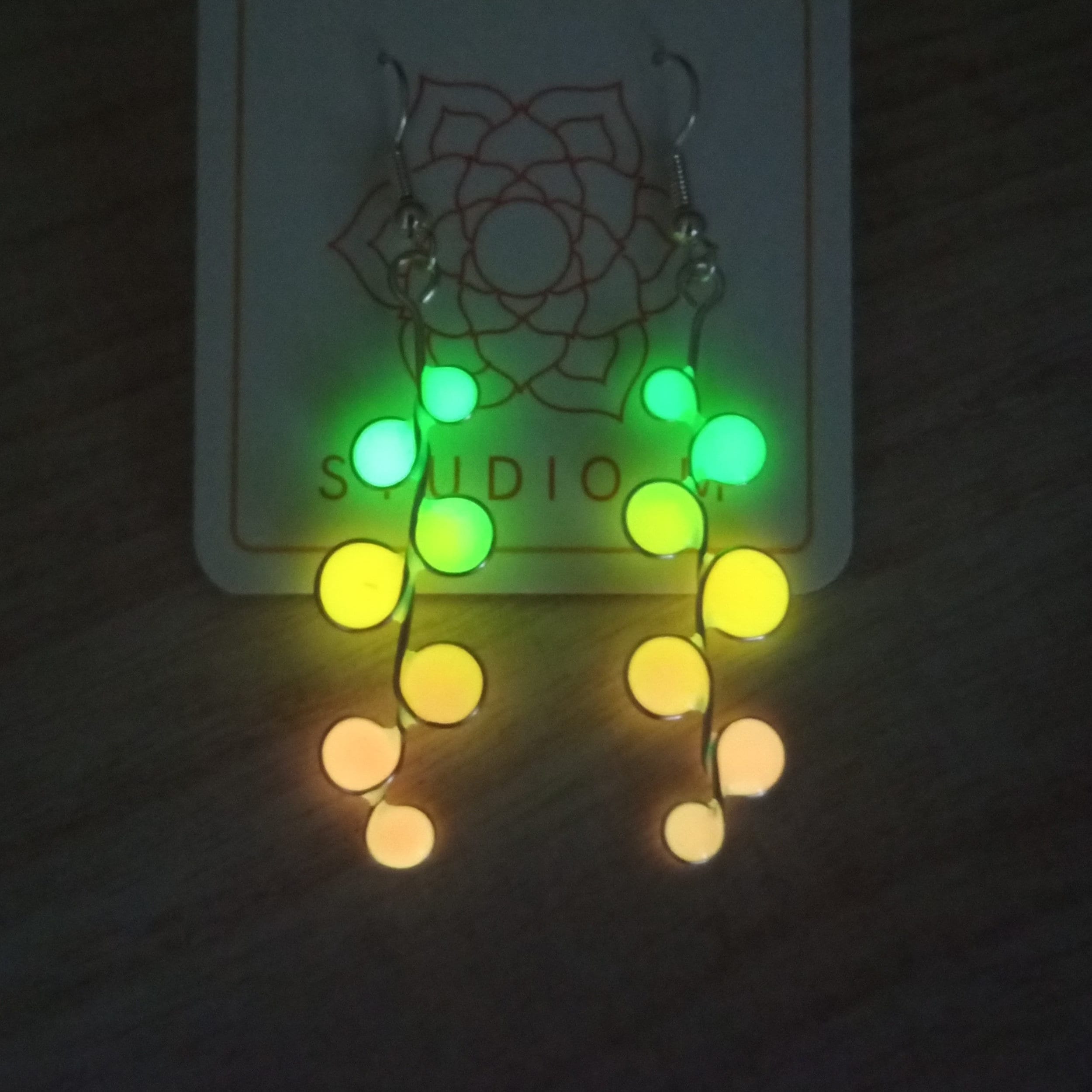 Peachy neon glow in the dark earrings