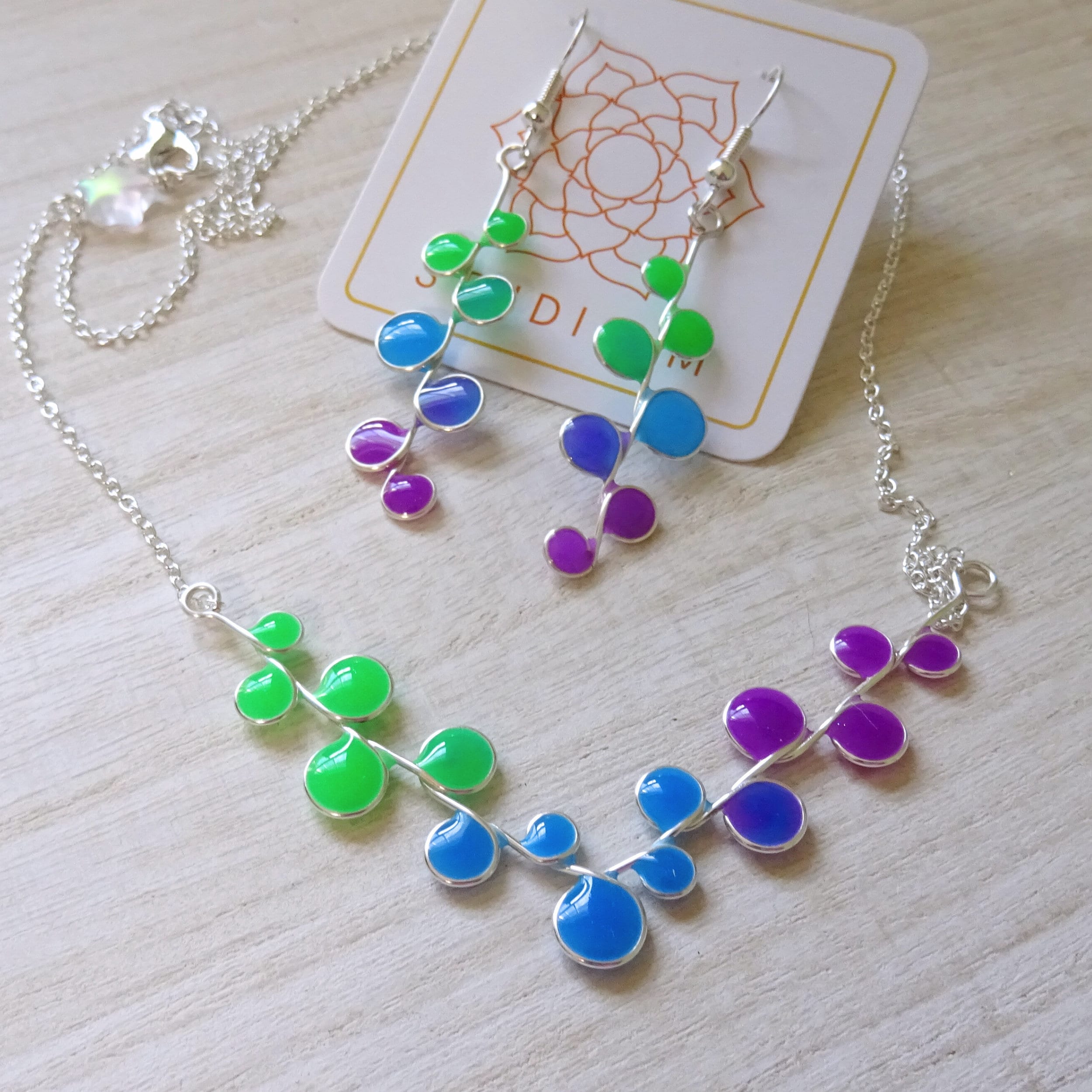 Green, blue, and purple Glow in the Dark Earrings