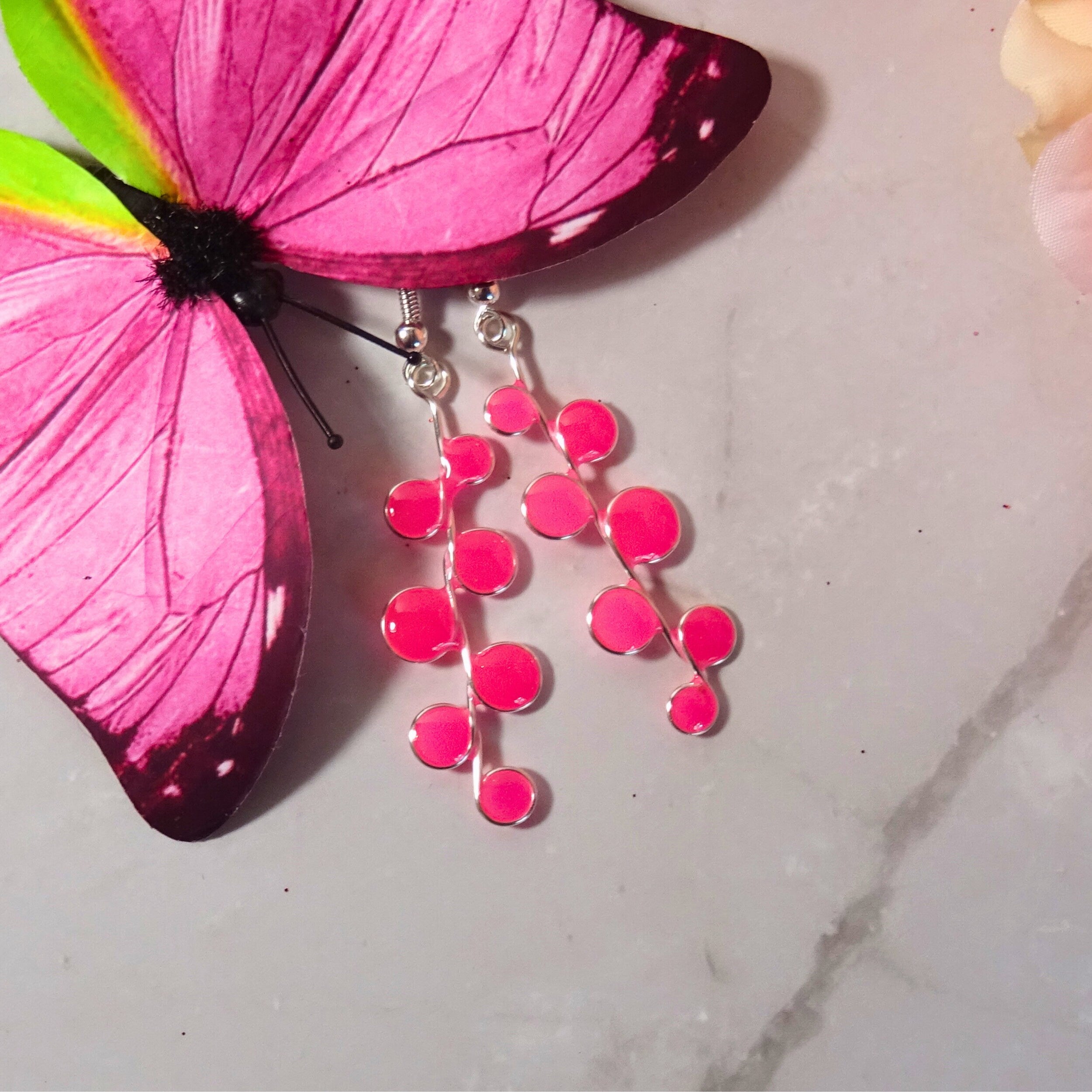 Neon pink glow in the dark earrings