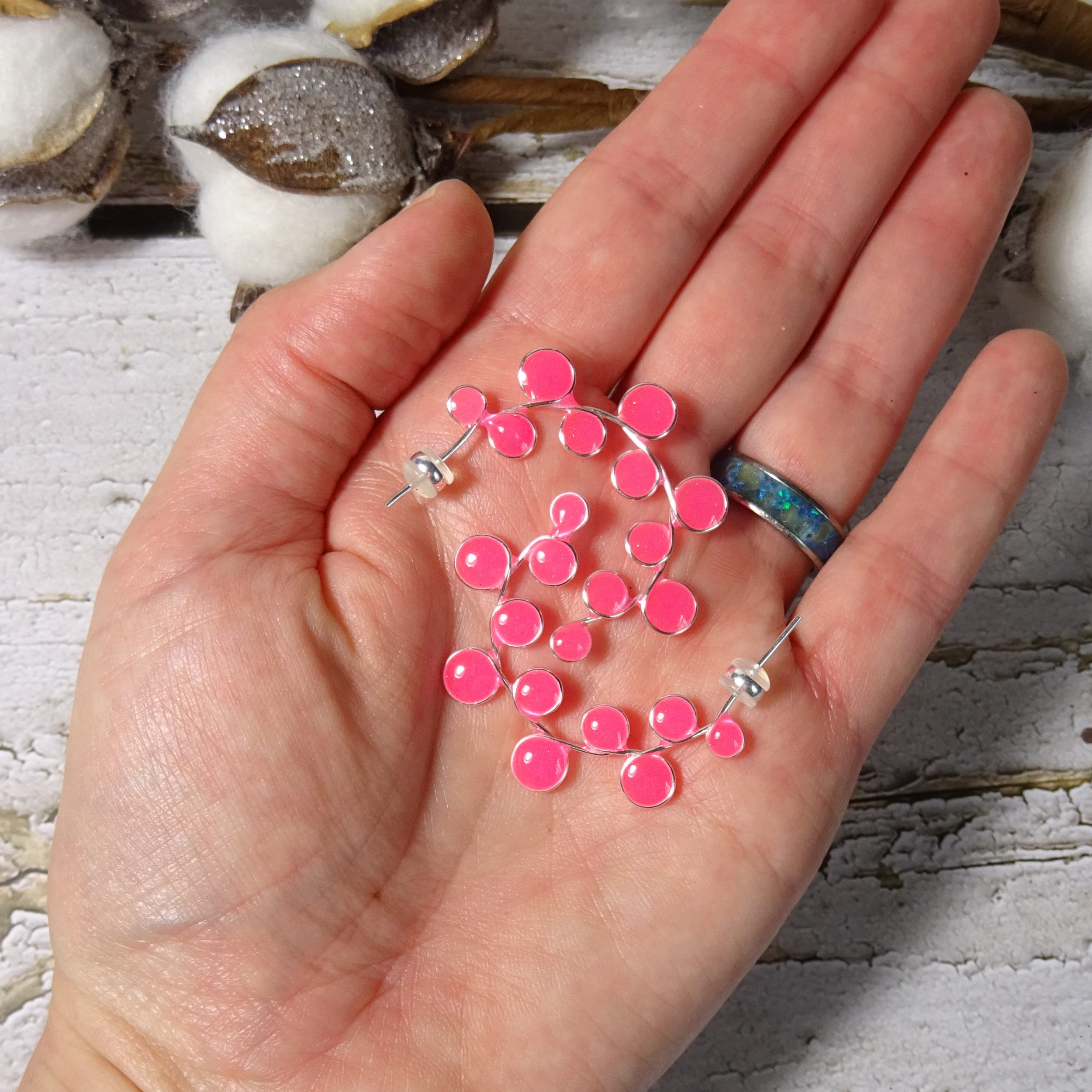 Neon pink glow in the dark hoop earrings