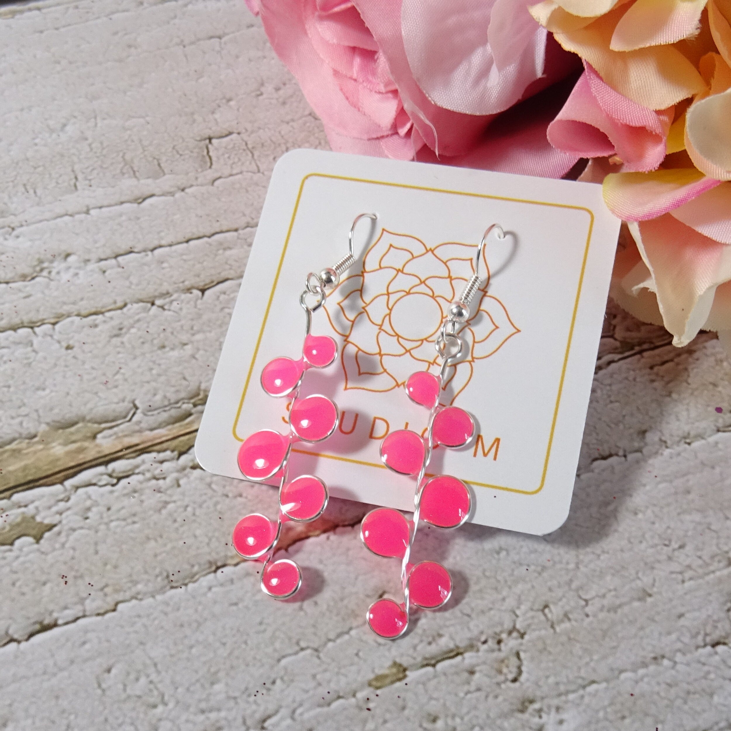 Neon pink glow in the dark earrings